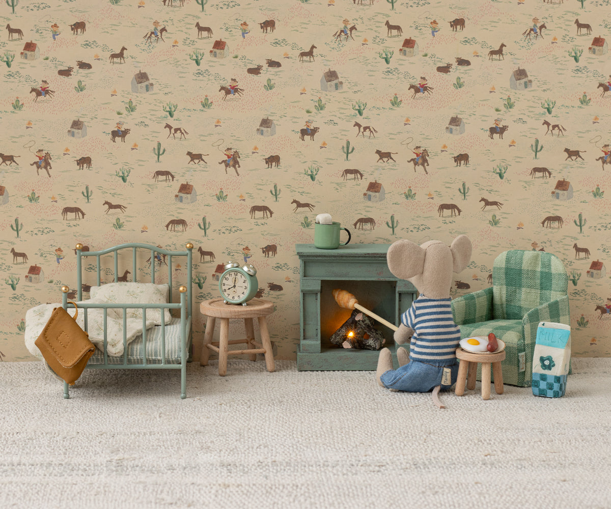 Maileg mice children's room with wallpaper featuring animal patterns, furniture, and toys.