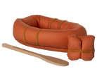 Orange inflatable raft with wooden oar on a white background