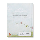 Notebook cover with a quote and illustrations of birds and flowers on a light blue background