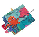 Children's soft book with ocean-themed illustrations on a white background