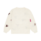 An off-white knit sweater with long sleeves, featuring an all-over pattern of small hearts in dark brown, pink, and light gray.