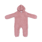 Pink knitted baby romper with a hood on a white background