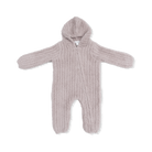 Knitted baby romper with a hood on a white background