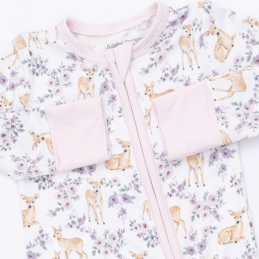 Baby onesie with deer and floral pattern on a white background