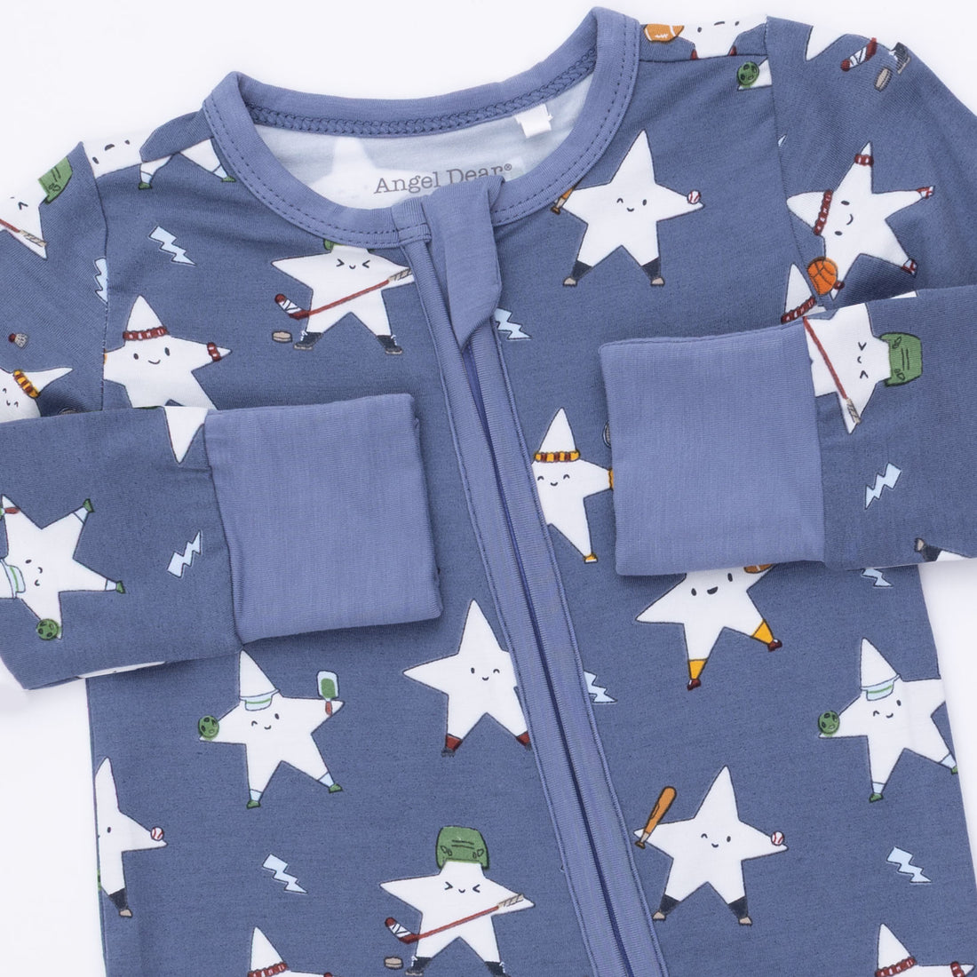Blue children's outfit with star pattern on a white background
