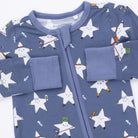 Blue children's outfit with star pattern on a white background