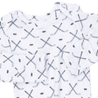 White long-sleeve baby t-shirt with an all-over hockey stick and dot pattern in gray and black.