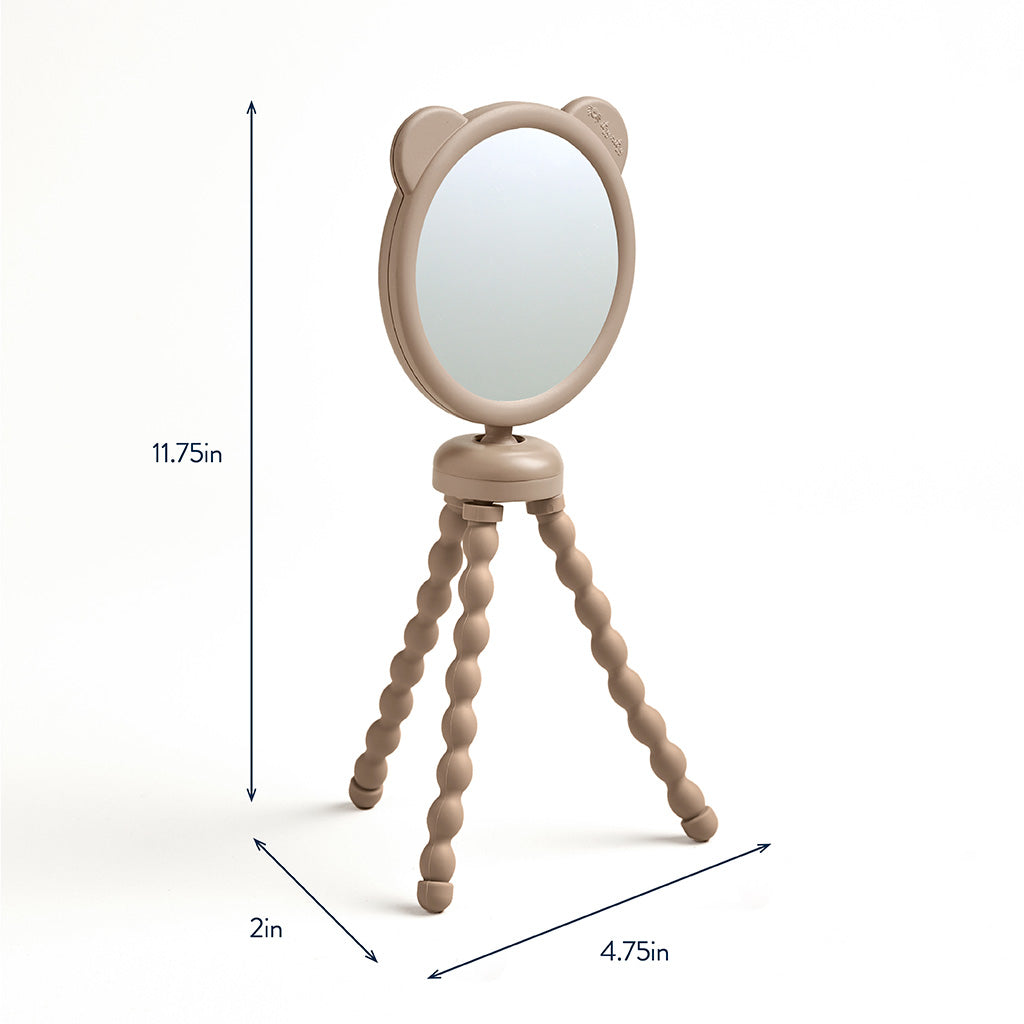 Small round mirror with a wooden stand on a white background, showing dimensions.