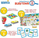 Busy Town educational toy set with cards, game board, and character figures on a white background.