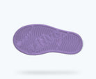 Purple shoe sole with brand logo on a white background