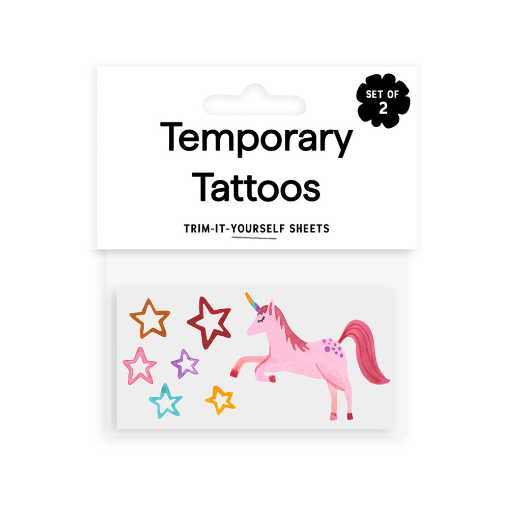 Pack of temporary tattoos with a unicorn and stars on a white background