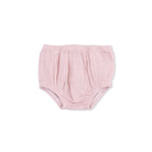 Pink baby bloomers on a white background