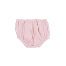 Pink baby bloomers on a white background