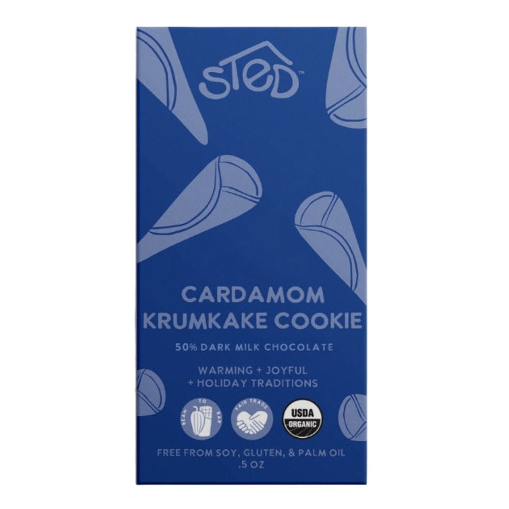 A 5 oz box of sted Cardamom Krumkake Cookie, featuring a dark blue packaging design with white text and illustrations of krumkake cones.