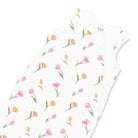 Floral patterned paper with pink and yellow flowers on a white background