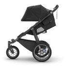 Black stroller with a visible brand logo on a white background