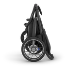 Black stroller with 'Ruck' branding on a white background