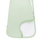 Light green baby hammock with white lining on a white background