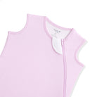 Pink sleeveless baby outfit with a visible brand label on a white background