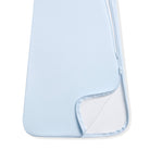 Clear phone case on a light blue background