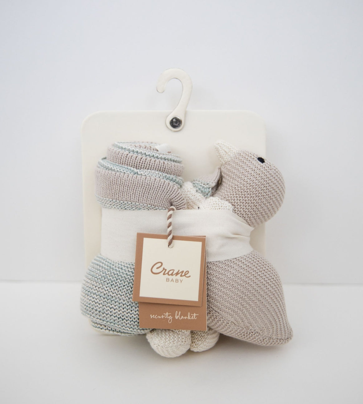 A baby gift set from Crane Baby featuring a knitted sheep plush toy and a matching knitted bootie, packaged on a white cardboard backing with a hanger.