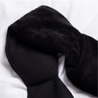 Black bow tie on a white background