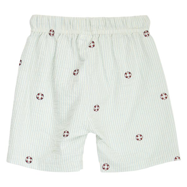 White shorts with red pattern on a white background