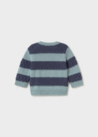A striped knit sweater shown from the back, featuring horizontal bands of navy blue and light blue-gray with a textured diamond pattern.
