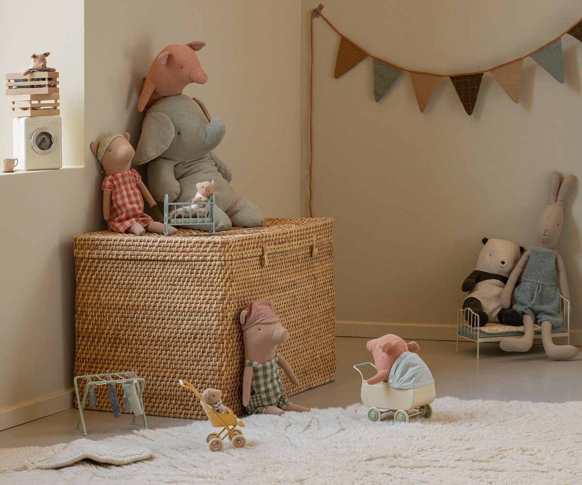 Children's room with toys and a wicker basket