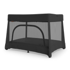 A black UPPAbaby Remi V2 Playard shown on a checkered background.