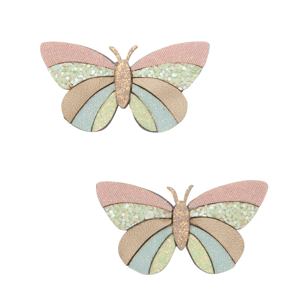 Two butterfly-shaped decorative items with pastel colors on a white background
