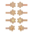 Set of six floral headbands with beige flowers on a white background
