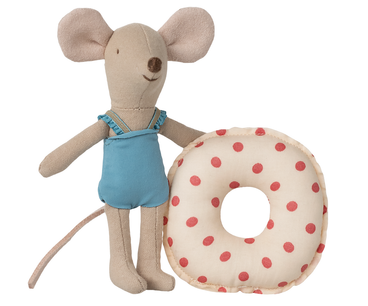 Stuffed mouse toy with a blue outfit holding a polka dot ring on a white background