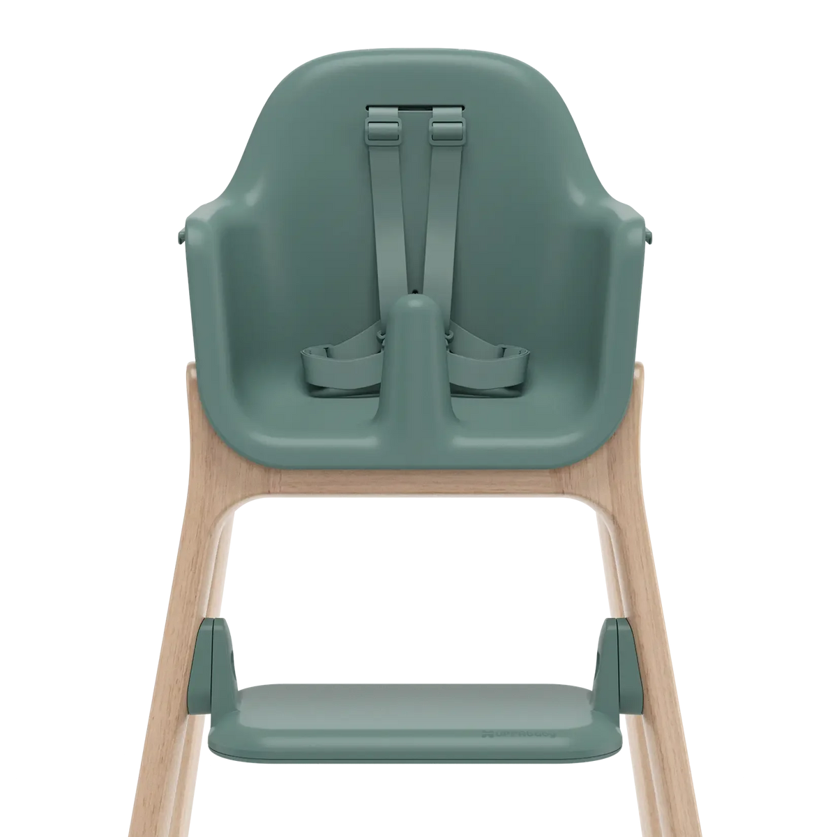 A high chair with a muted sage green molded plastic seat, straps, and footrest, supported by a light natural wood frame, shown from the rear on a white background.