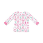 A long-sleeve children's top with a white base, featuring an all-over pattern of pink bows and Christmas trees in pink and mint green, finished with solid pink cuffs.
