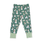 Green children's leggings with dog pattern on a white background