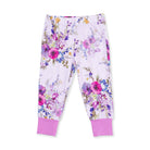 A pair of children's jogger pants featuring a light purple and white floral print with vibrant pink, purple, and blue flowers, finished with solid pink ribbed ankle cuffs.