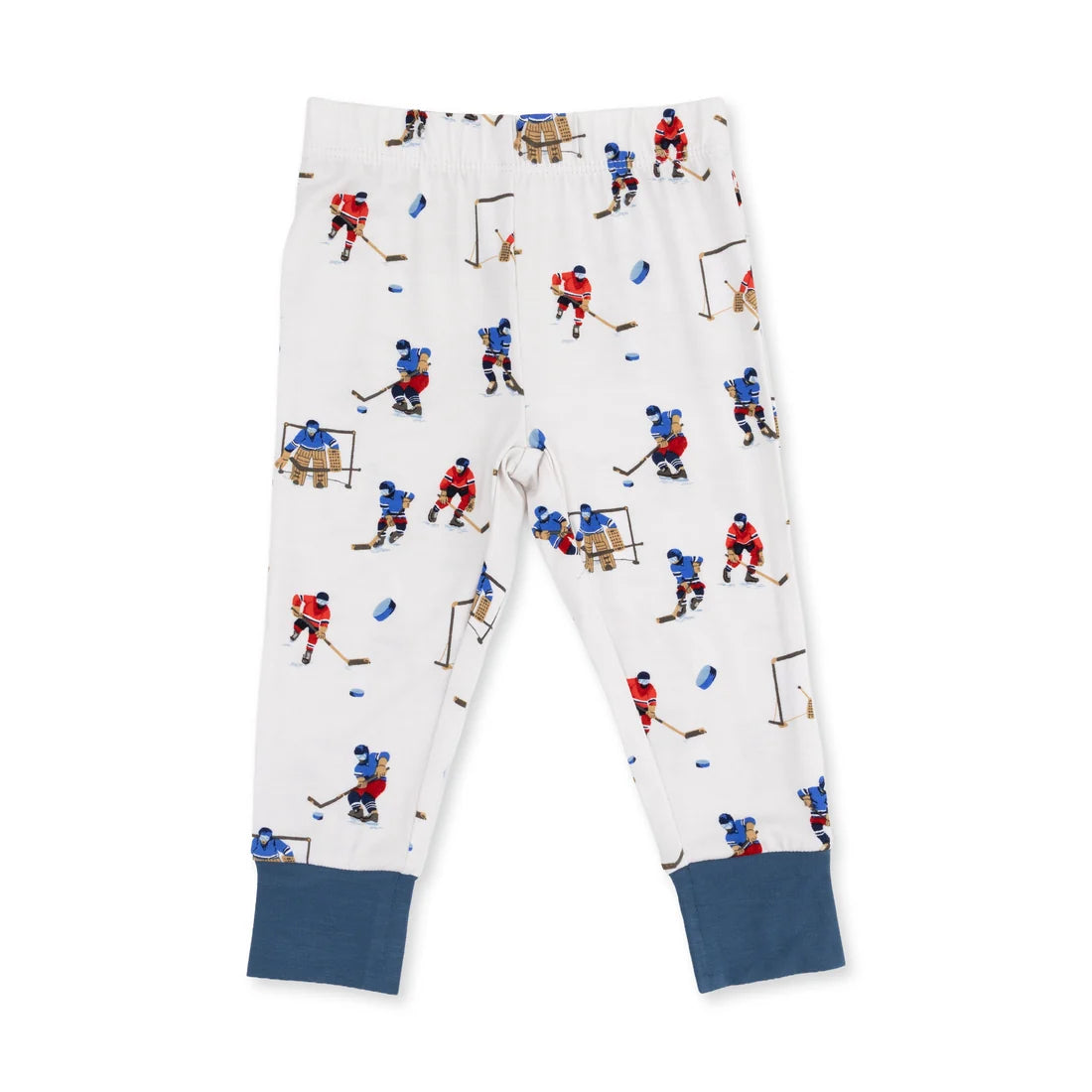 White children's pants with an all-over hockey player print and solid navy blue cuffed hems, shown flat on a white background.
