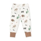 White children's jogger pants with an all-over woodland animal print including moose, bears, bison, and trees, finished with solid tan ankle cuffs.