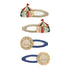 Set of four hair accessories with circus tent and lion designs on a white background