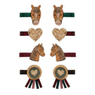Set of horse-themed hair accessories with decorative elements on a white background