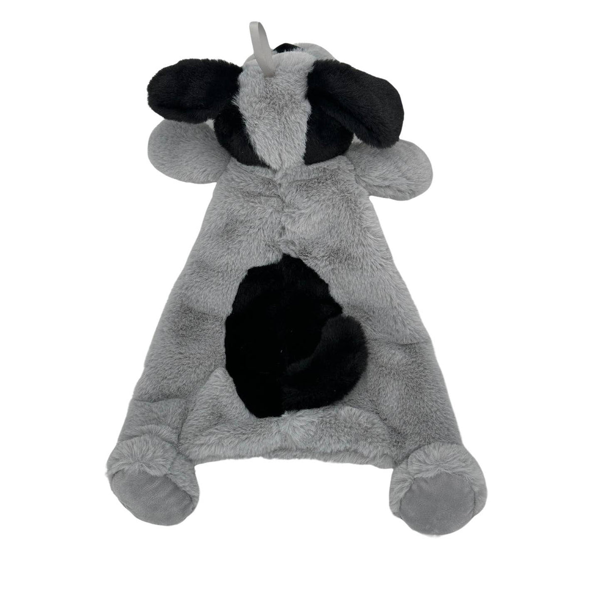 Plush toy shaped like a cow on a white background