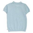 Light blue textured polo shirt on a white background