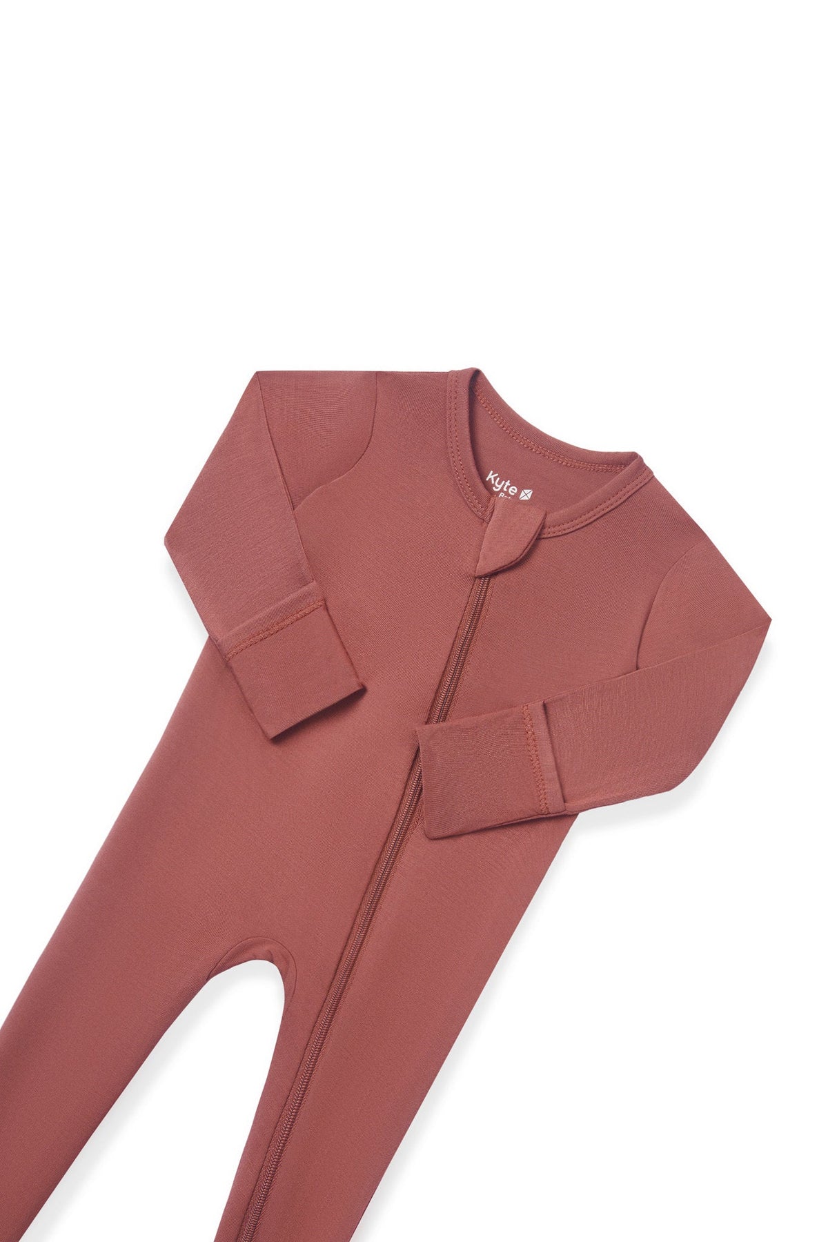 A dusty rose full-body zip-up sleeper or one-piece pajama laid flat on a white background.