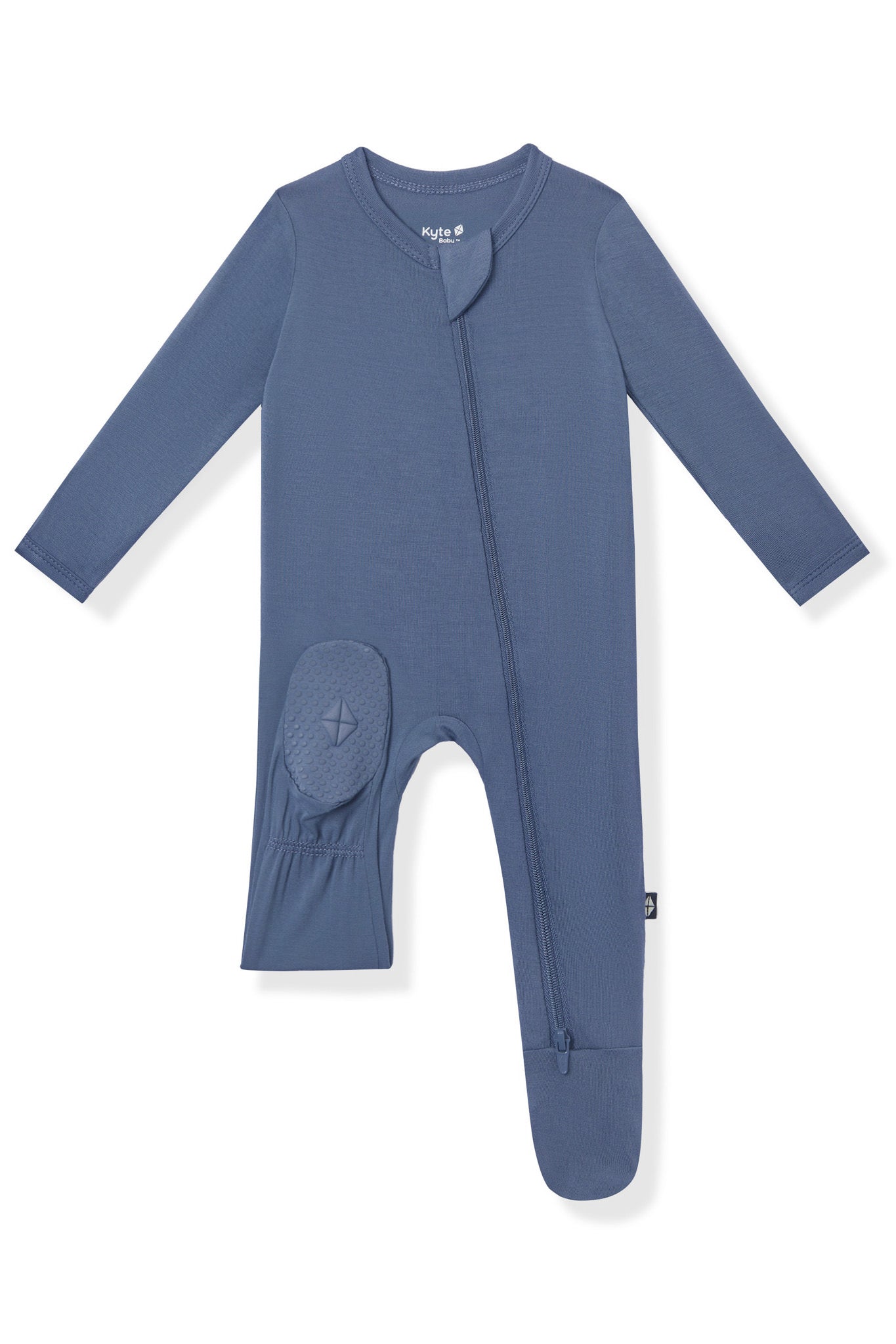 A baby long-sleeve footed sleeper in a dusty slate blue color, featuring a zippered front and a textured knee patch, shown on a plain white background.