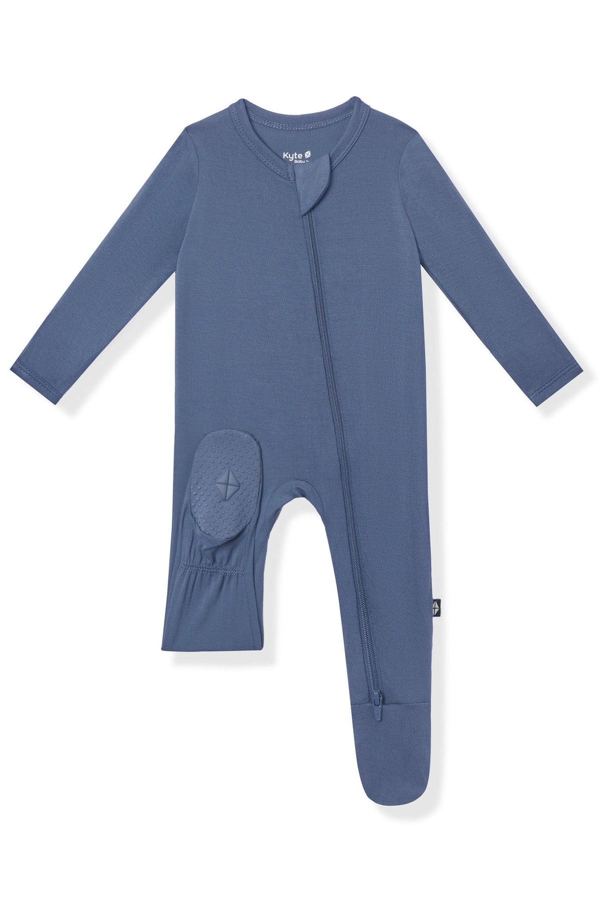 A baby long-sleeve footed sleeper in a dusty slate blue color, featuring a zippered front and a textured knee patch, shown on a plain white background.