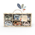 Set of wooden toy cars in a display case with a white background
