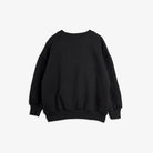 A black long-sleeve crewneck sweatshirt with a relaxed, oversized fit and ribbed cuffs and hem, shown from the back on a light gray background.