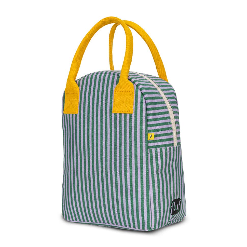 Striped bag with yellow handles on a white background