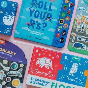 Collection of educational children's books and sticker sets on a clear background